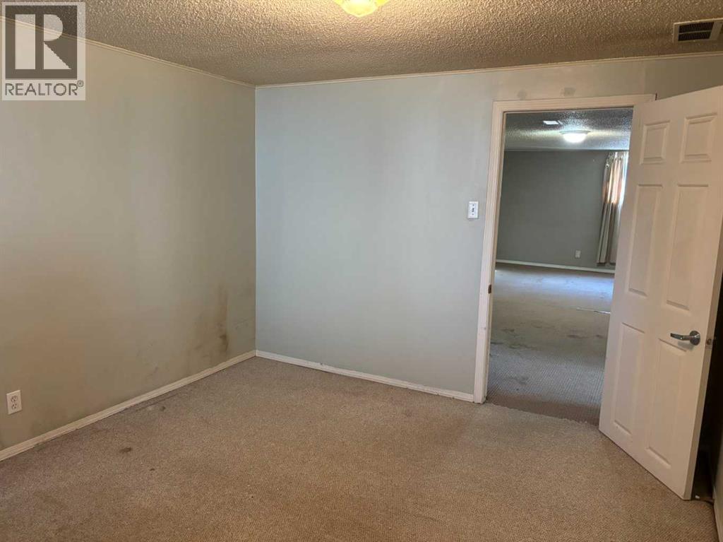 Single Family House Bungalow for Sale in  Halifax Crescent NW Banff Trail Calgary 