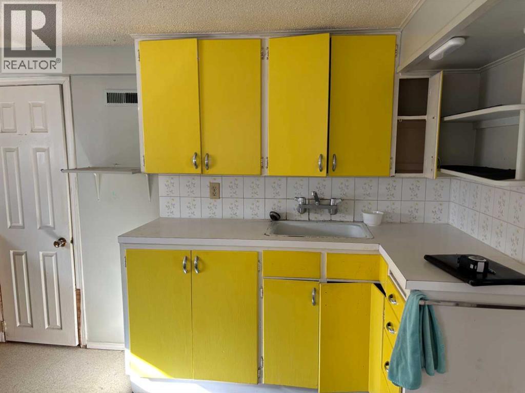 Single Family House Bungalow for Sale in  Halifax Crescent NW Banff Trail Calgary 