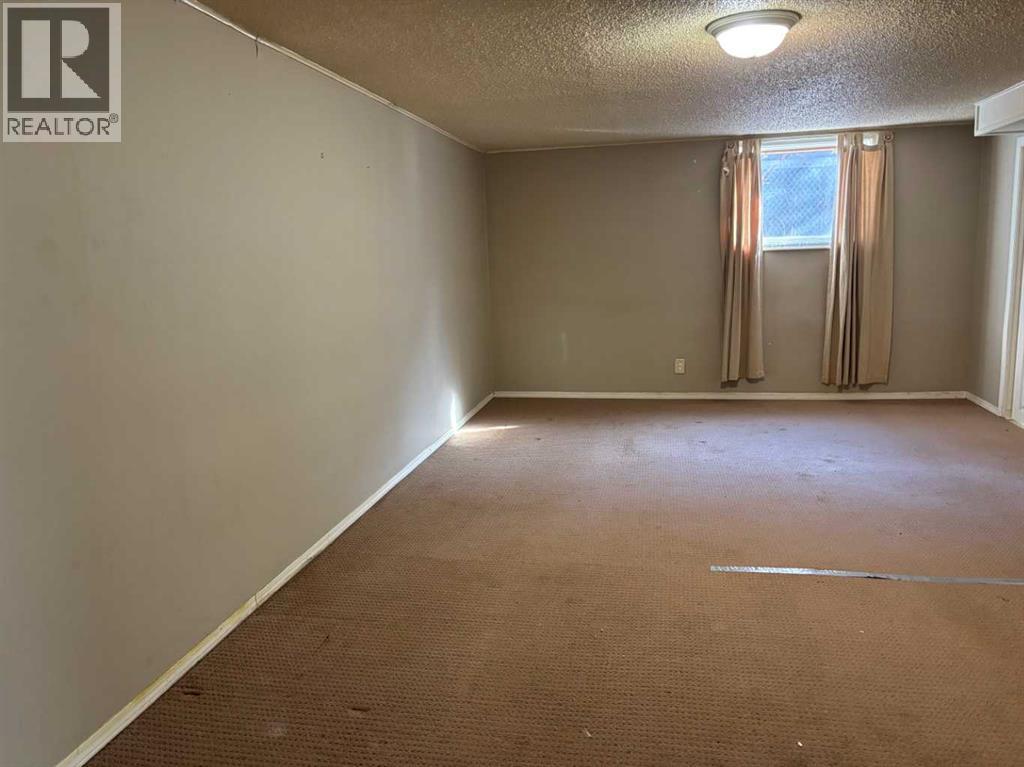 Single Family House Bungalow for Sale in  Halifax Crescent NW Banff Trail Calgary 