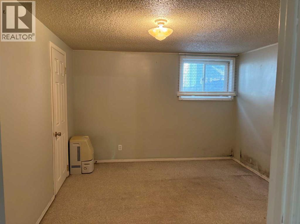 Single Family House Bungalow for Sale in  Halifax Crescent NW Banff Trail Calgary 