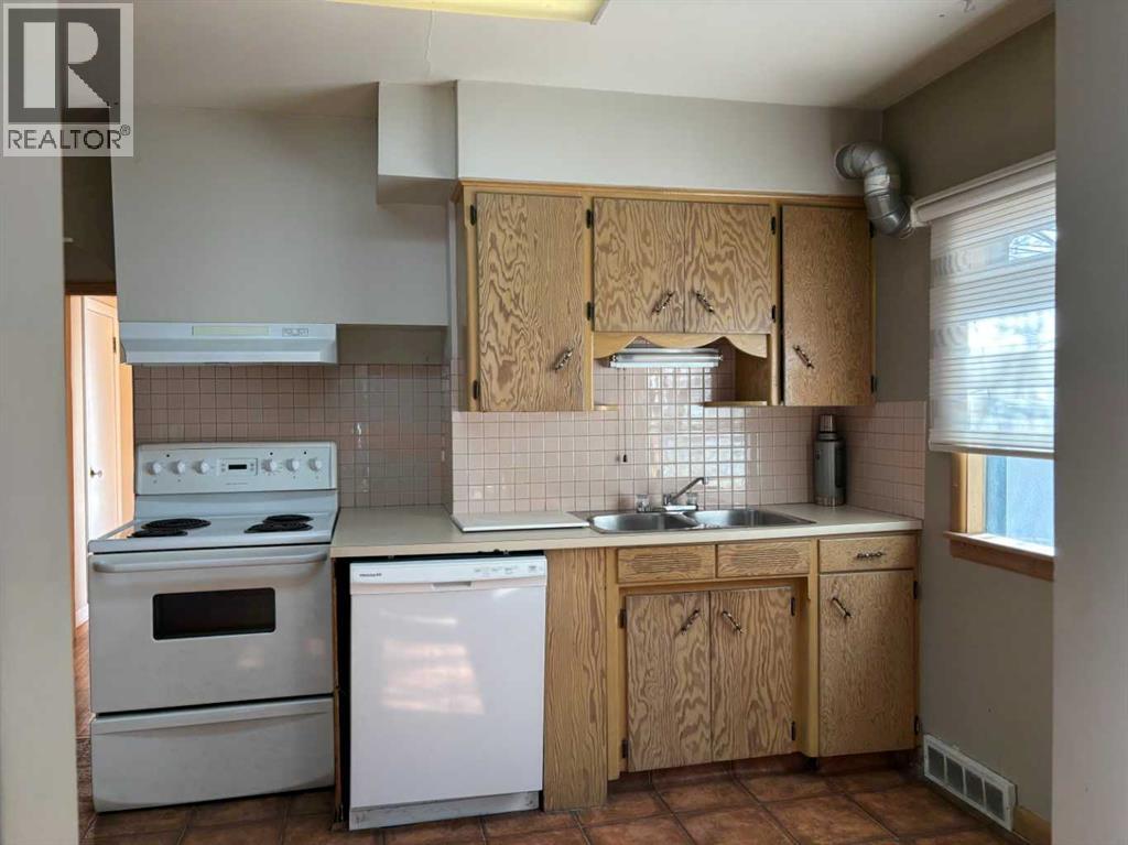 Single Family House Bungalow for Sale in  Halifax Crescent NW Banff Trail Calgary 