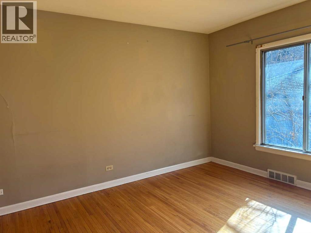 Single Family House Bungalow for Sale in  Halifax Crescent NW Banff Trail Calgary 