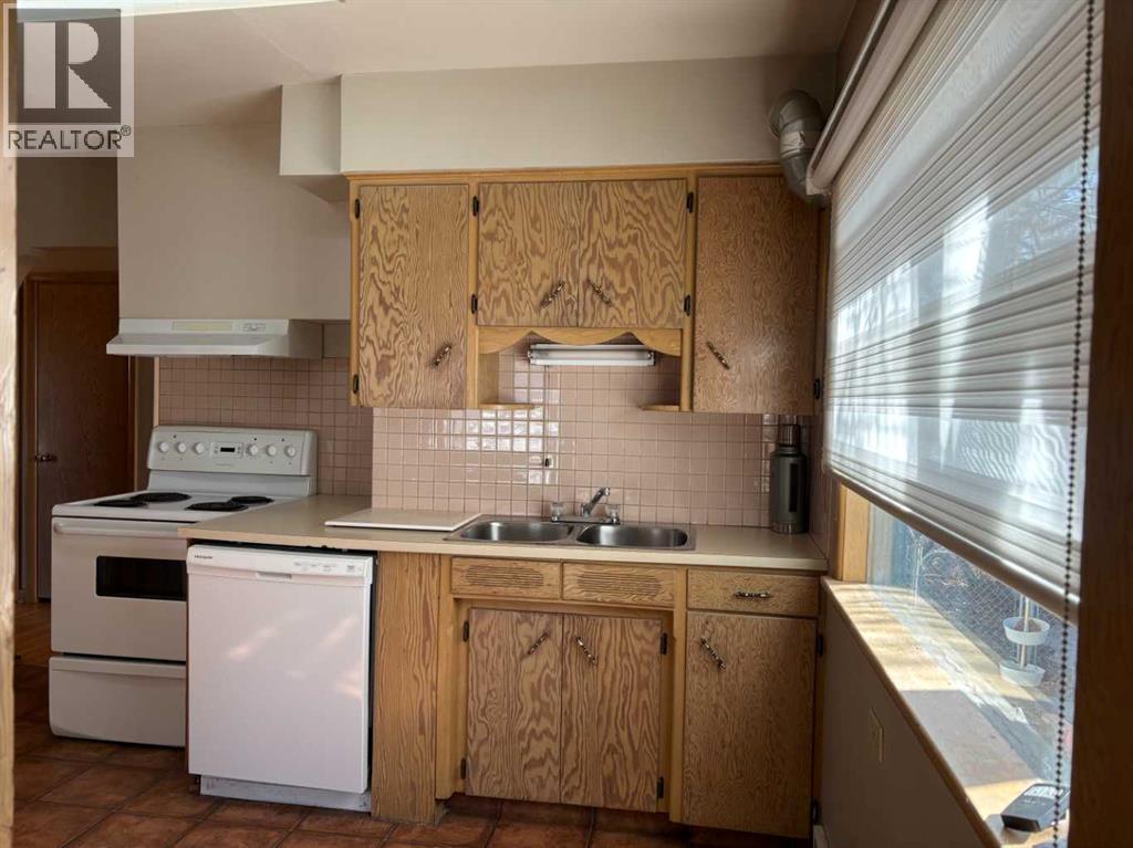 Single Family House Bungalow for Sale in  Halifax Crescent NW Banff Trail Calgary 