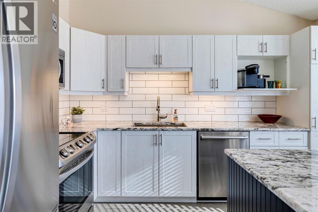 Single Family House 3 Level for Sale in  Sunlake Gardens SE Sundance Calgary 