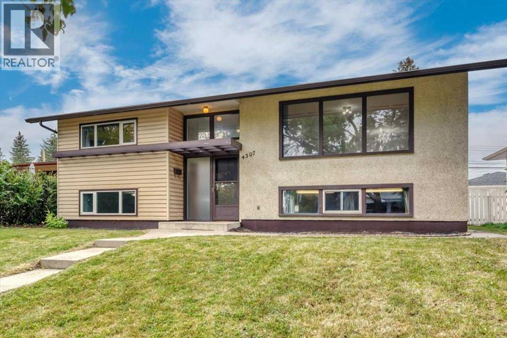 Single Family House Bi-level for Sale in  Brisebois Drive NW Brentwood Calgary 