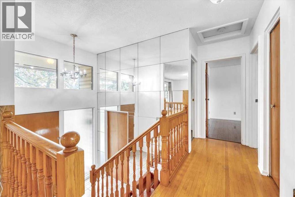 Single Family House Bi-level for Sale in  Brisebois Drive NW Brentwood Calgary 