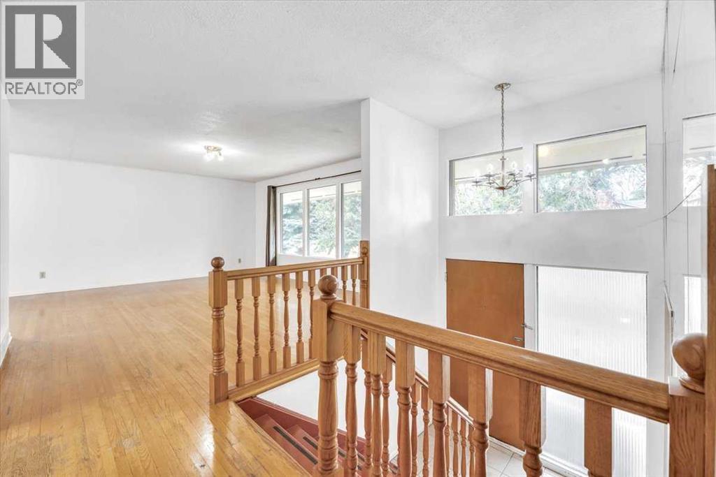 Single Family House Bi-level for Sale in  Brisebois Drive NW Brentwood Calgary 