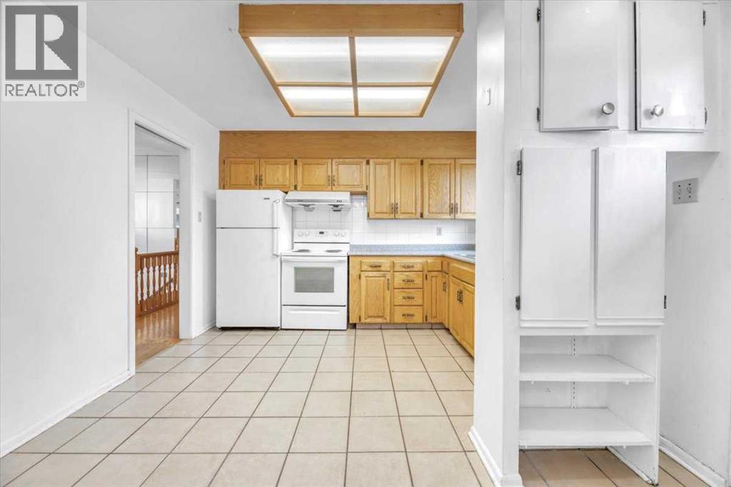 Single Family House Bi-level for Sale in  Brisebois Drive NW Brentwood Calgary 