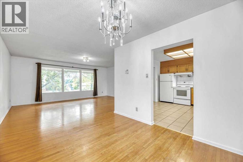 Single Family House Bi-level for Sale in  Brisebois Drive NW Brentwood Calgary 