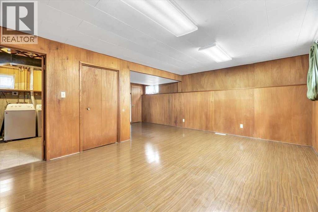 Single Family House Bi-level for Sale in  Brisebois Drive NW Brentwood Calgary 