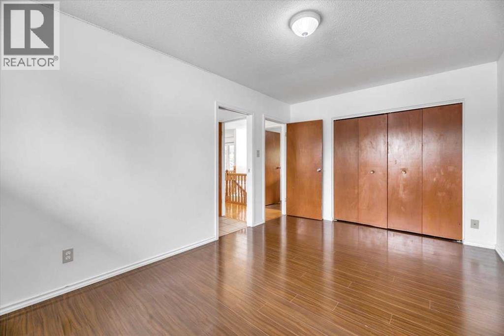 Single Family House Bi-level for Sale in  Brisebois Drive NW Brentwood Calgary 