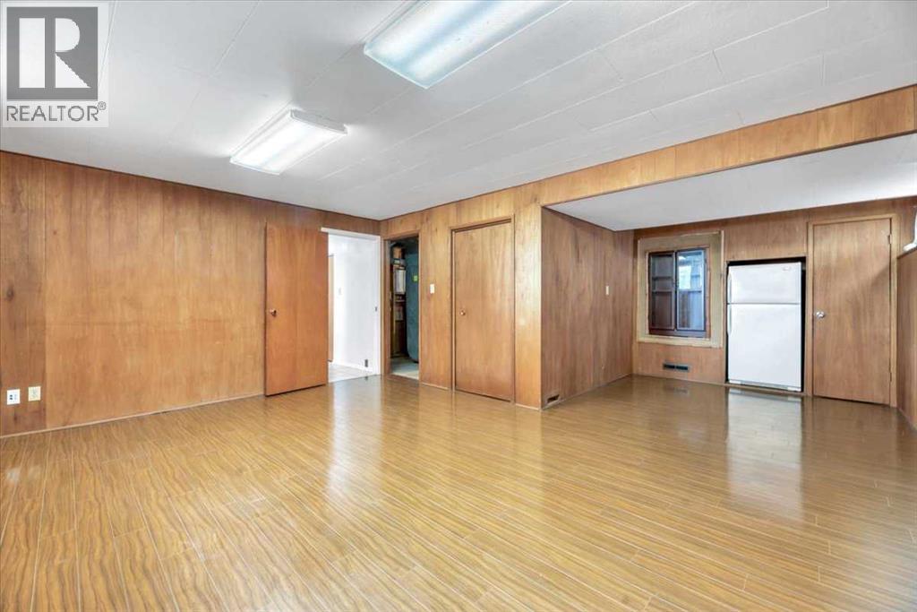 Single Family House Bi-level for Sale in  Brisebois Drive NW Brentwood Calgary 