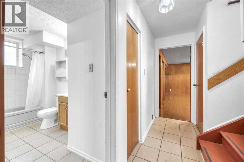 Single Family House Bi-level for Sale in  Brisebois Drive NW Brentwood Calgary 