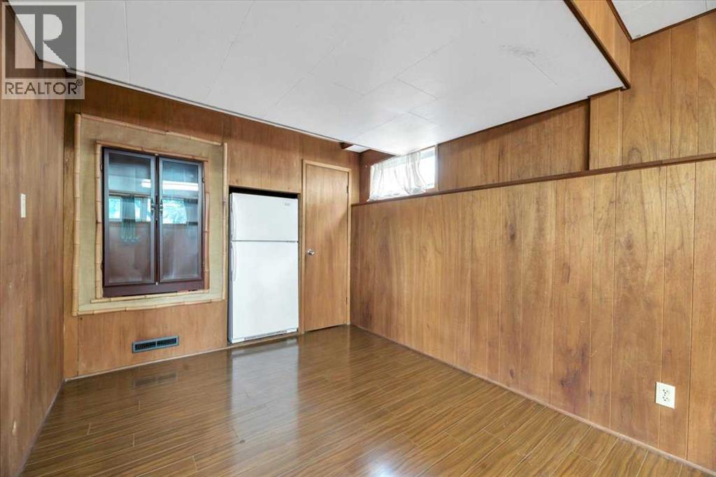 Single Family House Bi-level for Sale in  Brisebois Drive NW Brentwood Calgary 