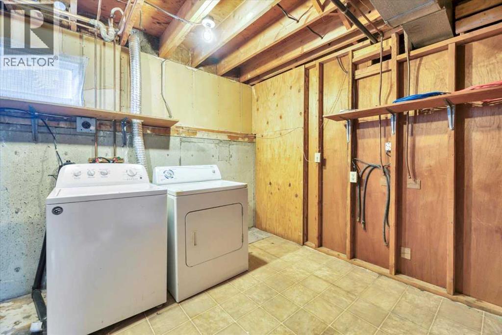 Single Family House Bi-level for Sale in  Brisebois Drive NW Brentwood Calgary 