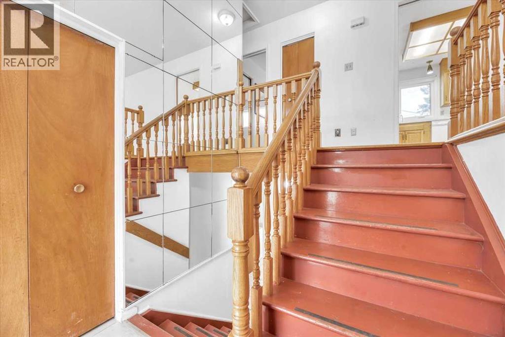 Single Family House Bi-level for Sale in  Brisebois Drive NW Brentwood Calgary 