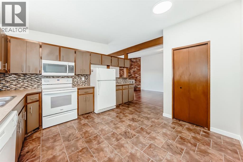 Multi-family House 4 Level for Sale in  &   Street NW Dalhousie Calgary 
