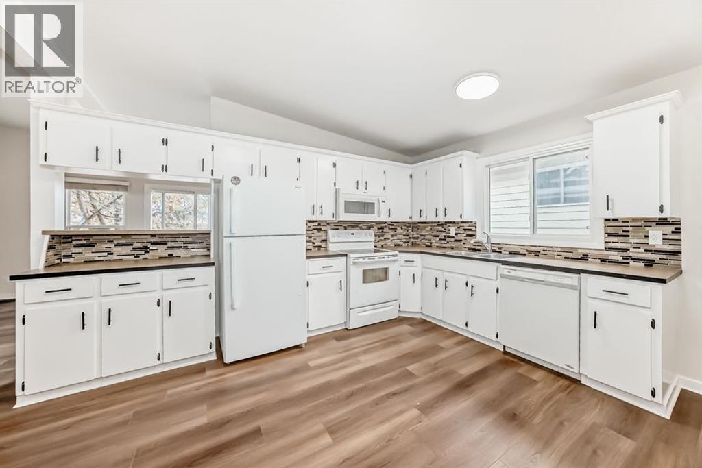 Multi-family House 4 Level for Sale in  &   Street NW Dalhousie Calgary 