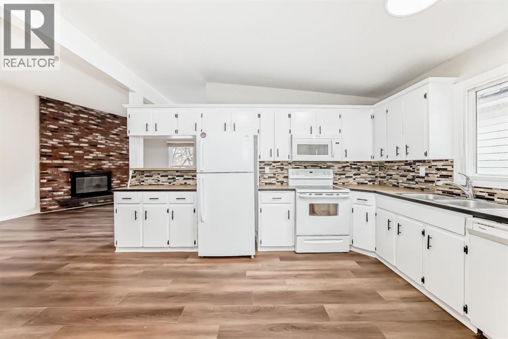 Multi-family House 4 Level for Sale in  &   Street NW Dalhousie Calgary 
