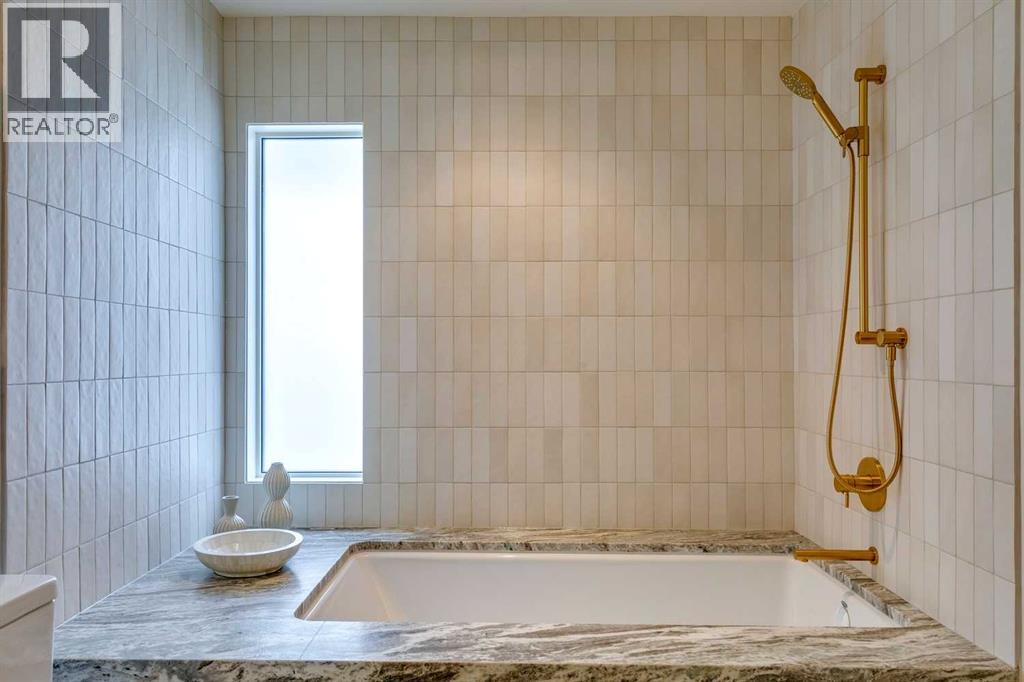 Single Family House 4 Level for Sale in  Elizabeth Road SW Britannia Calgary 