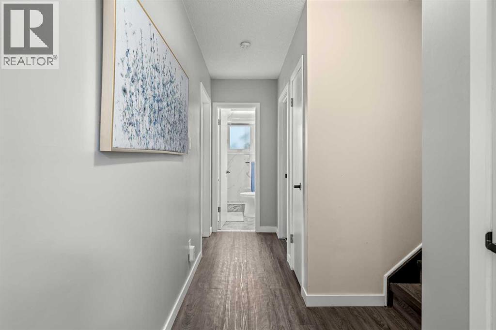 Single Family House Bi-level for Sale in  Bearspaw Drive NW Brentwood Calgary 