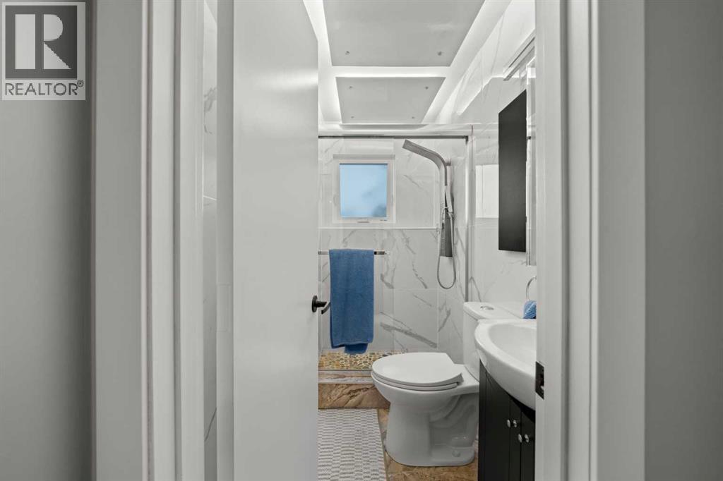 Single Family House Bi-level for Sale in  Bearspaw Drive NW Brentwood Calgary 