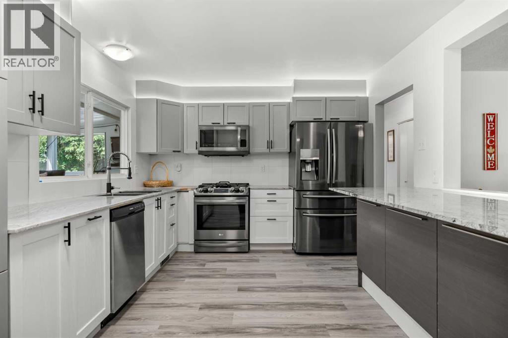 Single Family House Bi-level for Sale in  Bearspaw Drive NW Brentwood Calgary 