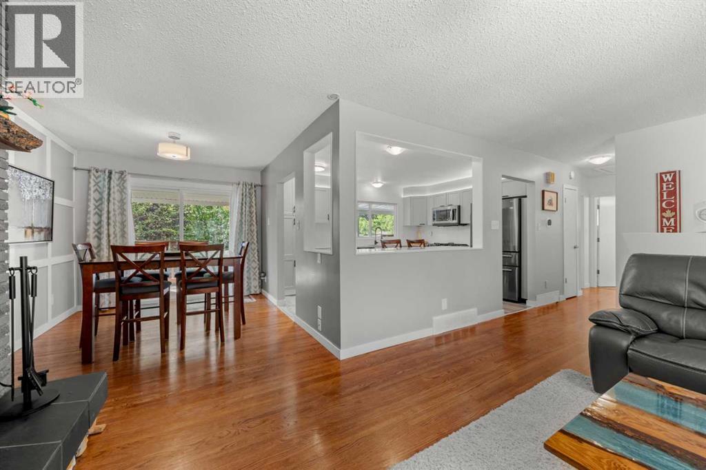 Single Family House Bi-level for Sale in  Bearspaw Drive NW Brentwood Calgary 