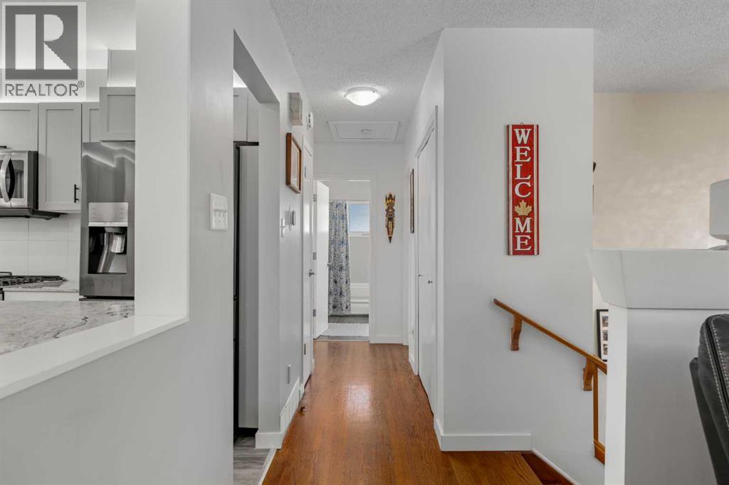 Single Family House Bi-level for Sale in  Bearspaw Drive NW Brentwood Calgary 