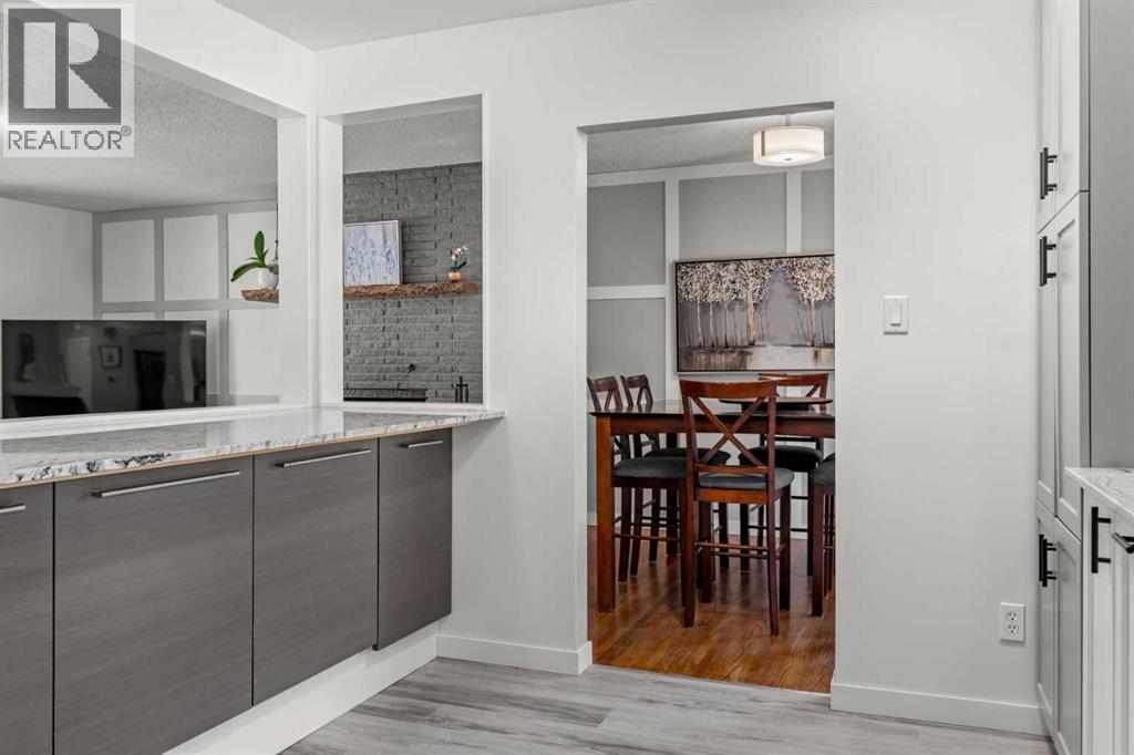 Single Family House Bi-level for Sale in  Bearspaw Drive NW Brentwood Calgary 