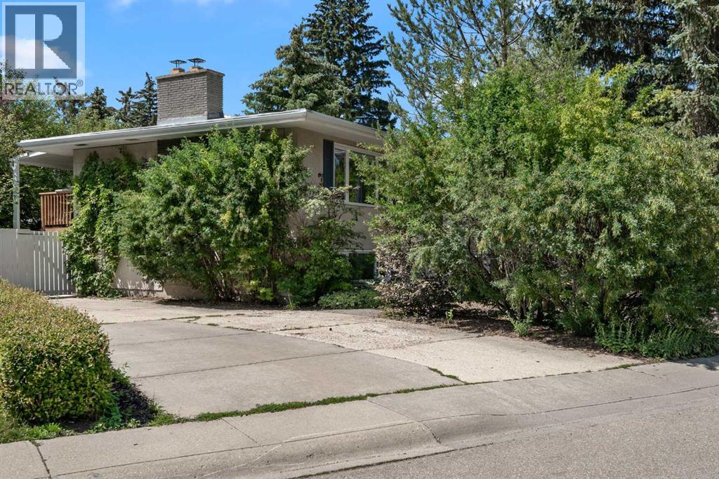 Single Family House Bi-level for Sale in  Bearspaw Drive NW Brentwood Calgary 