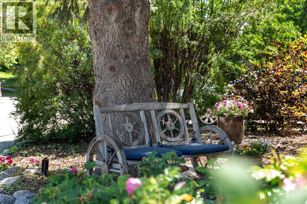 Single Family House Bi-level for Sale in  Bearspaw Drive NW Brentwood Calgary 