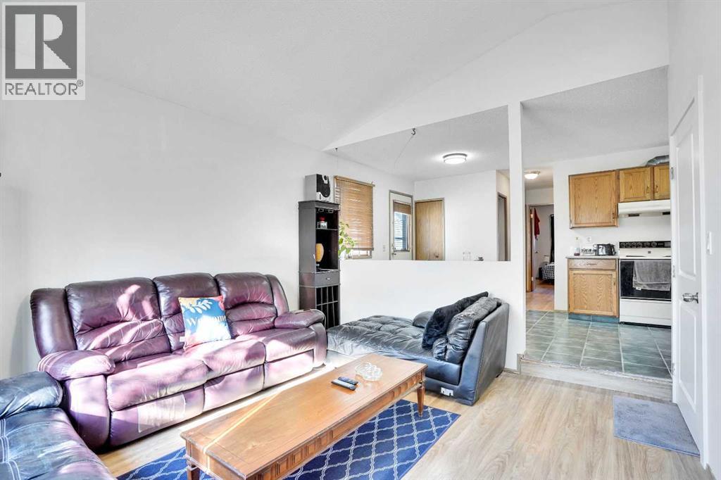 Single Family House Bi-level for Sale in  Erin Park Drive SE Erin Woods Calgary 