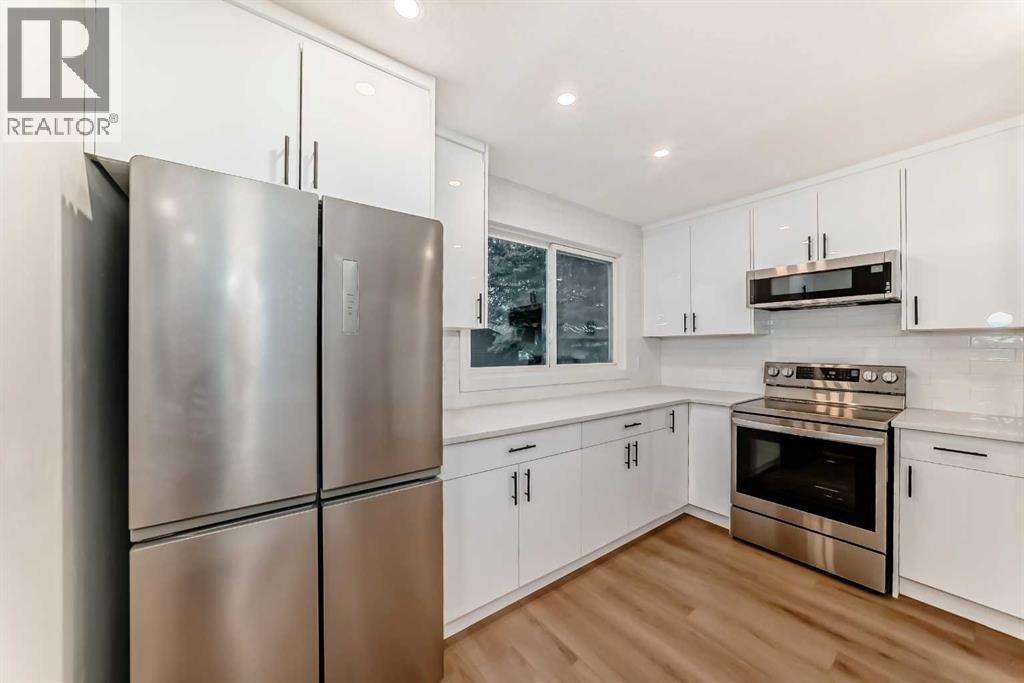 Single Family House 4 Level for Sale in  Penbrooke Drive SE Penbrooke Meadows Calgary 