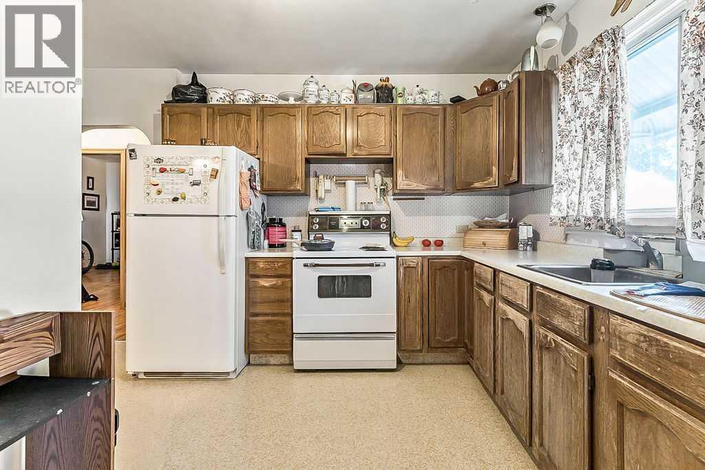 Single Family House Bungalow for Sale in  Morley Trail NW Banff Trail Calgary 