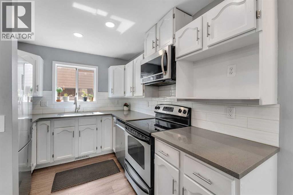 Single Family House 3 Level for Sale in  Erin Green Way SE Erin Woods Calgary 