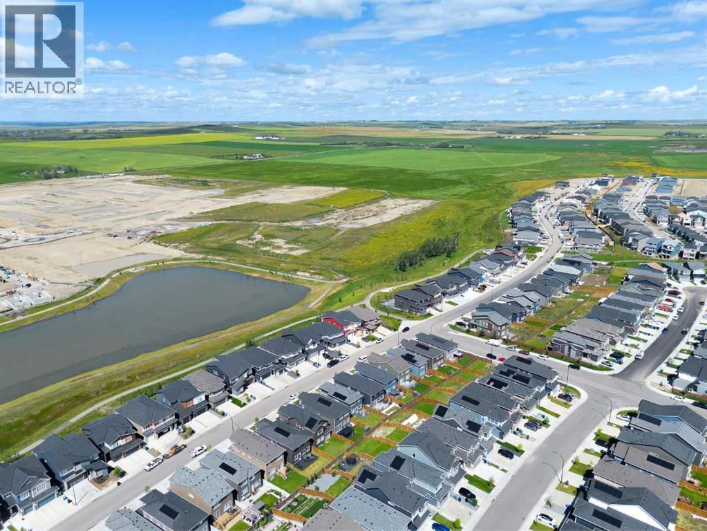 Single Family House for Sale in  Lucas Way NW Livingston Calgary 