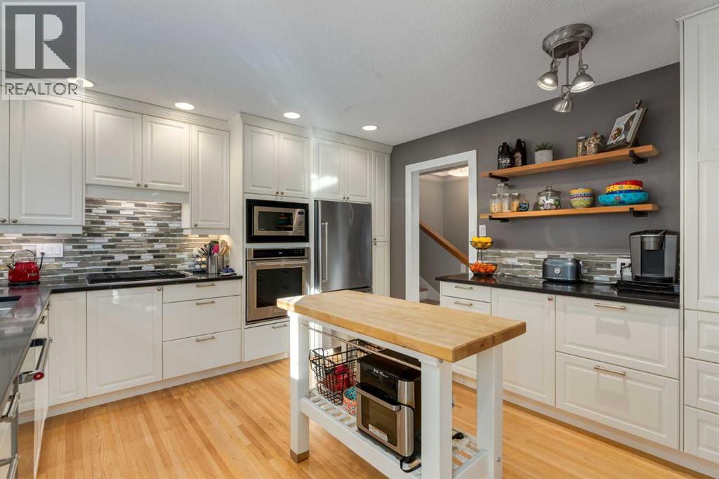 Single Family House 4 Level for Sale in  Lake Emerald Crescent SE Lake Bonavista Calgary 