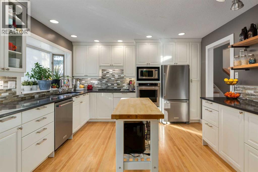 Single Family House 4 Level for Sale in  Lake Emerald Crescent SE Lake Bonavista Calgary 