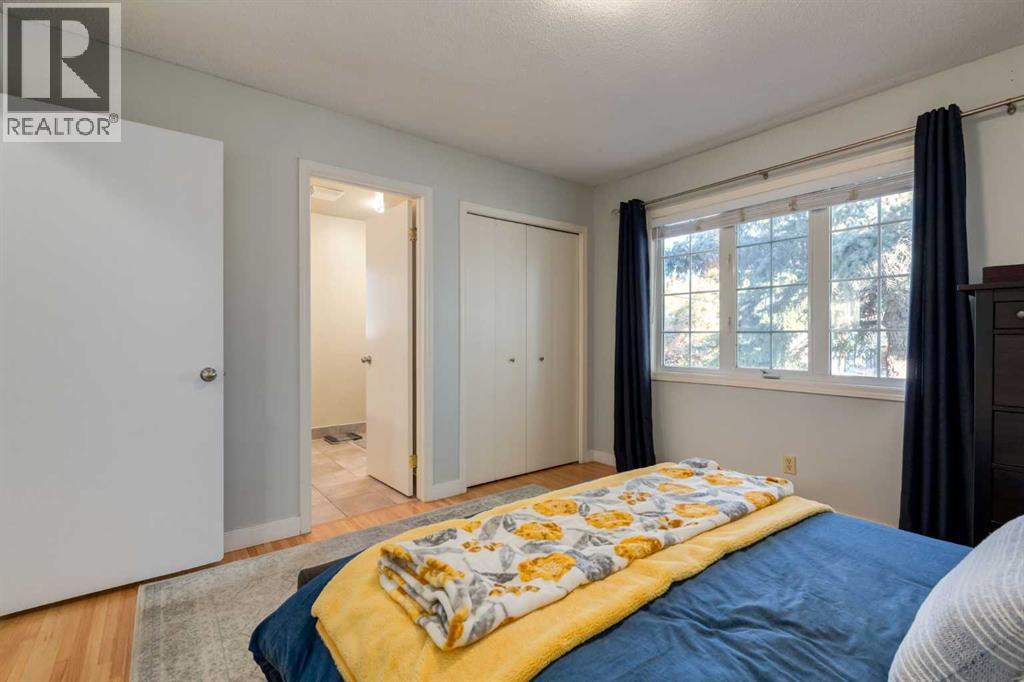 Single Family House 4 Level for Sale in  Lake Emerald Crescent SE Lake Bonavista Calgary 