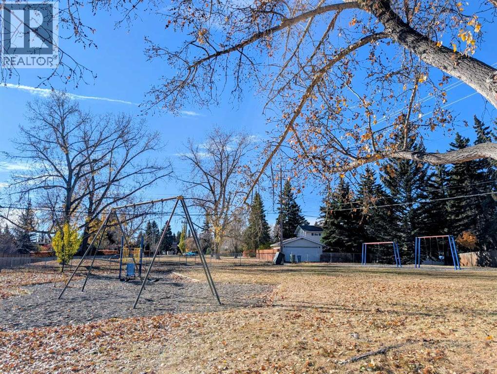 Single Family House 4 Level for Sale in  Lake Emerald Crescent SE Lake Bonavista Calgary 