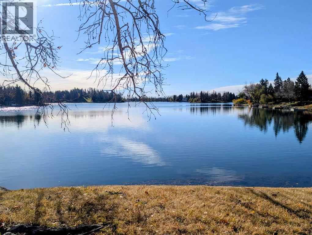 Single Family House 4 Level for Sale in  Lake Emerald Crescent SE Lake Bonavista Calgary 