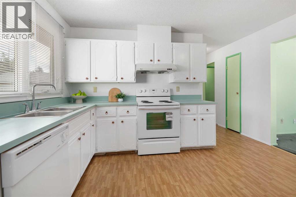 Single Family House Bungalow for Sale in  Queensland Drive SE Queensland Calgary 