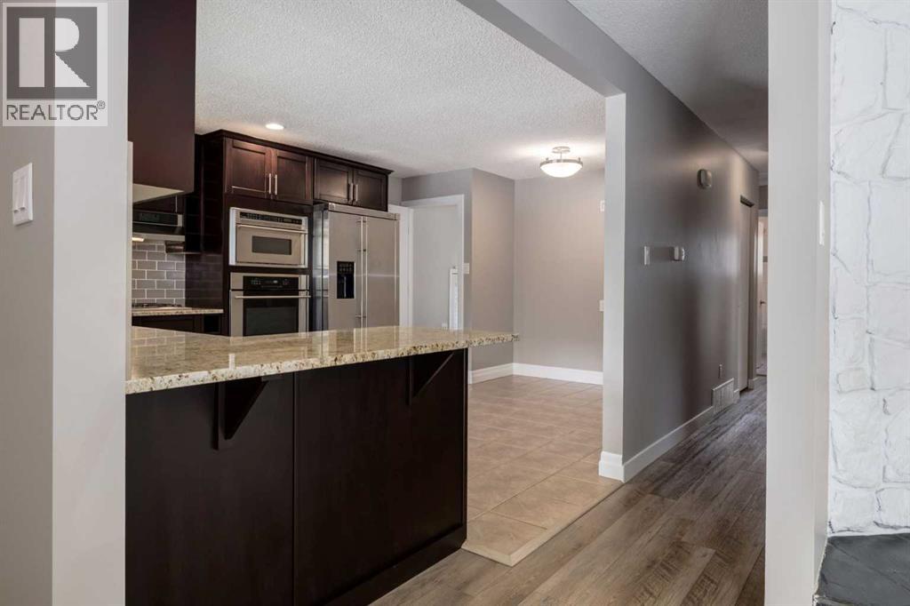 Single Family House Bungalow for Sale in  Cantrell Drive SW Canyon Meadows Calgary 