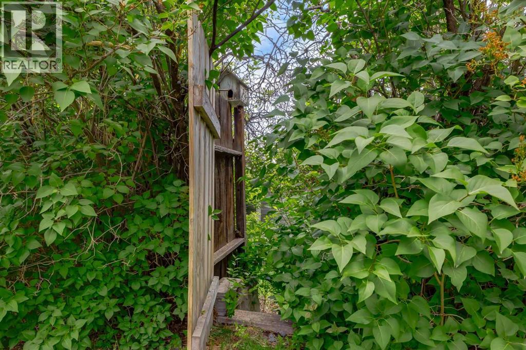 Single Family House Bungalow for Sale in  Cantrell Drive SW Canyon Meadows Calgary 