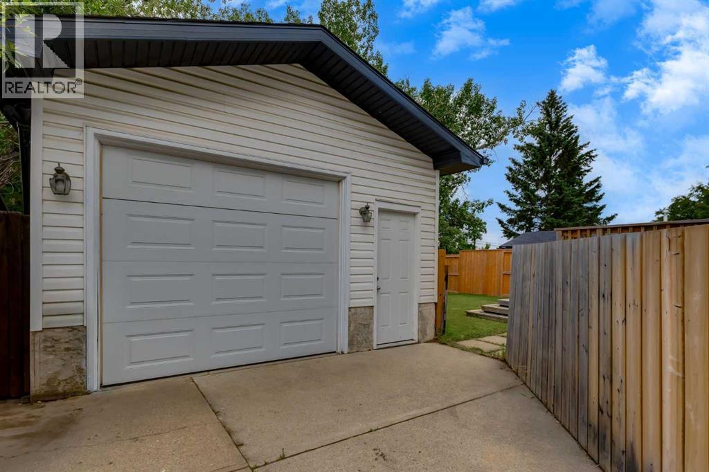 Single Family House Bungalow for Sale in  Cantrell Drive SW Canyon Meadows Calgary 