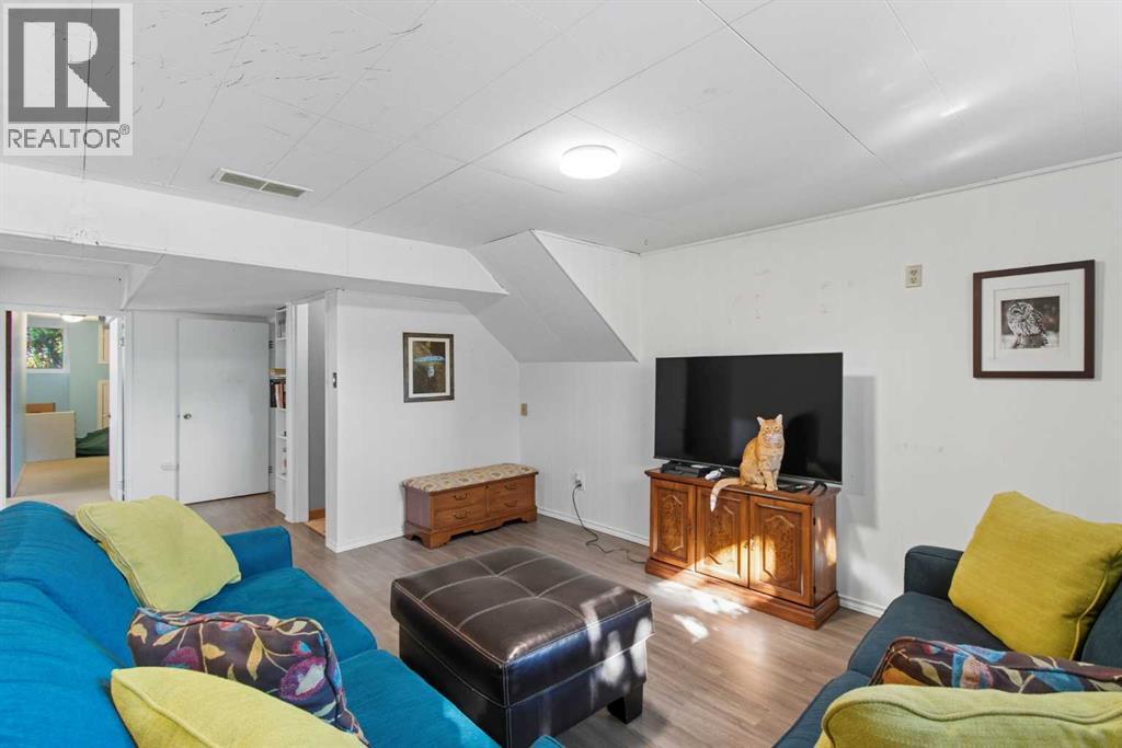 Single Family House Bi-level for Sale in  Brazeau Crescent SW Braeside Calgary 