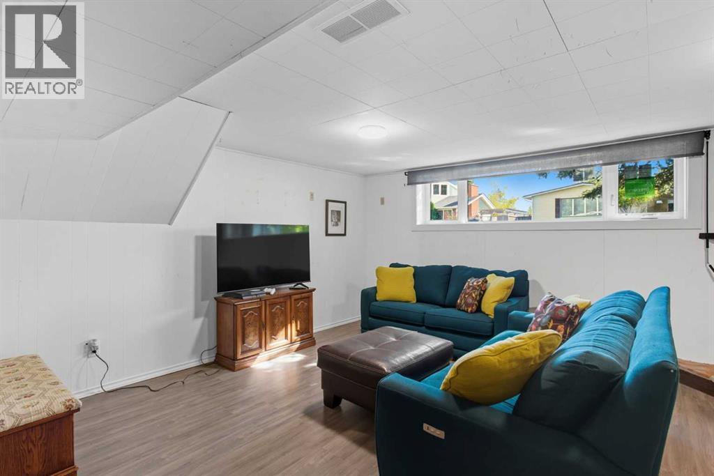 Single Family House Bi-level for Sale in  Brazeau Crescent SW Braeside Calgary 