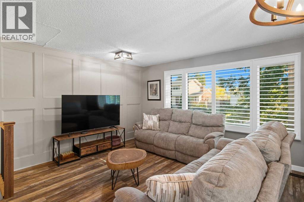 Single Family House Bi-level for Sale in  Brazeau Crescent SW Braeside Calgary 