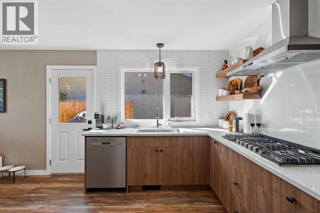 Single Family House Bi-level for Sale in  Brazeau Crescent SW Braeside Calgary 